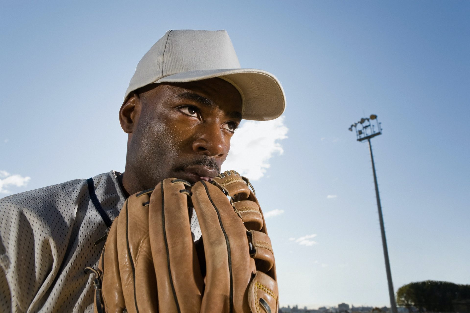 Athlete in baseball gear preparing for TrackMan™ pitching and hitting evaluation.